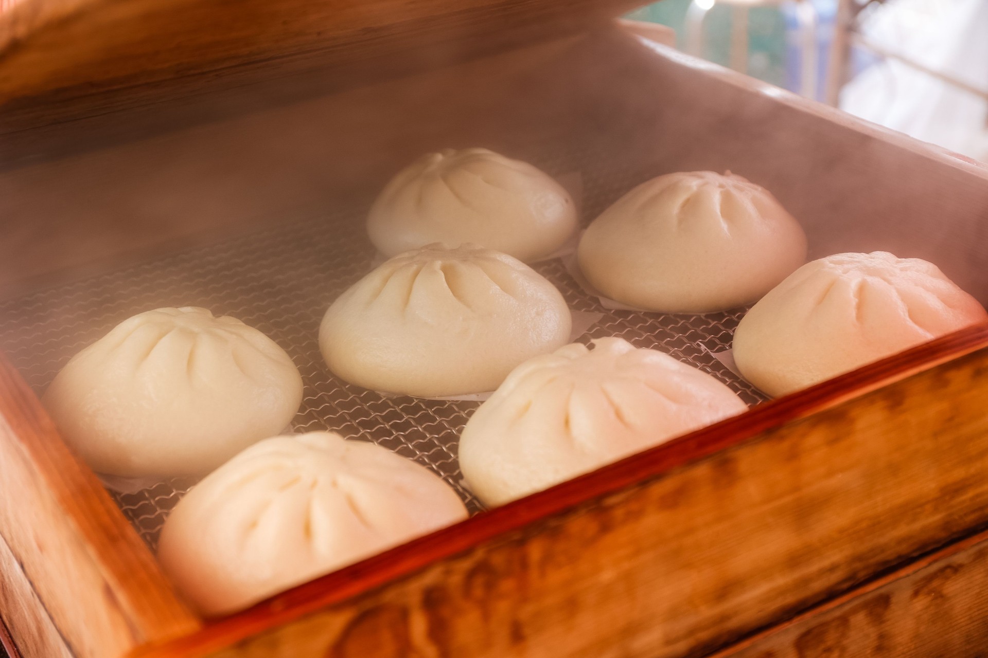 Delicious hot steamed "nikuman" buns at outdoor food market