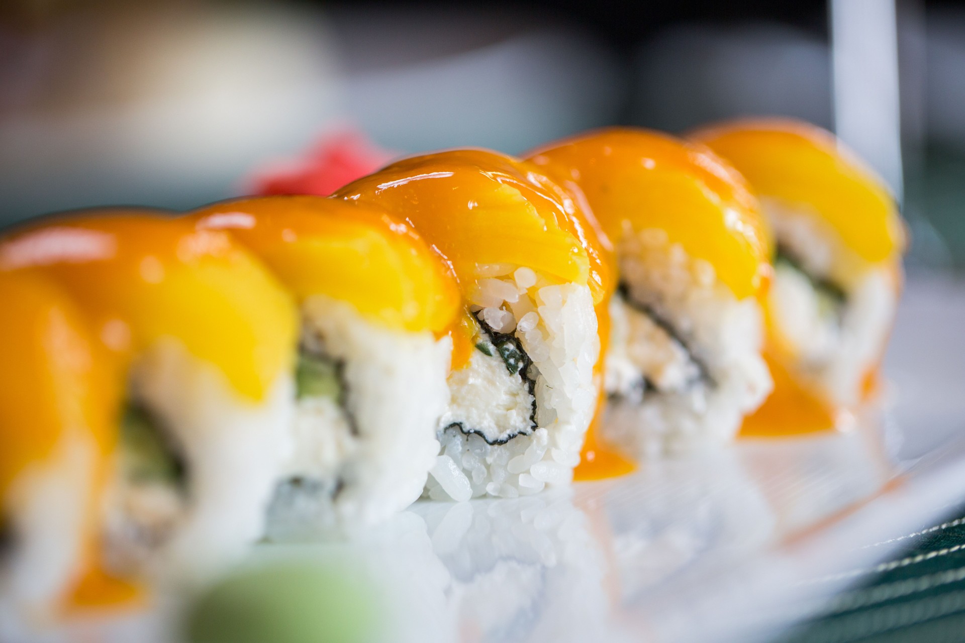 Japanese sushi with crab and mango